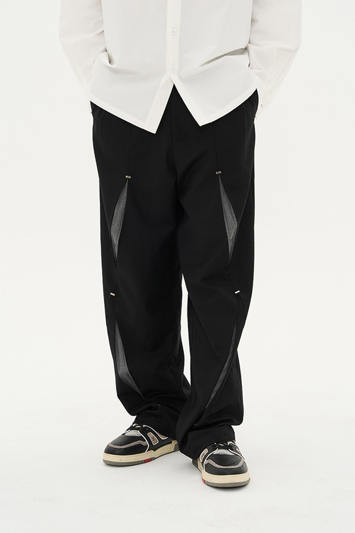 Three-dimensional cut ripped deconstructed patchwork metal button trousers